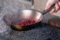 cherry sauce for poultry in a pan