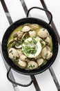 Sauteed clams tapas in lemon garlic parsley sauce in spain