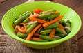 Sauteed green beans with carrots, onion and garlic Royalty Free Stock Photo