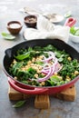 Sauteed kale with chickpeas and red onion Royalty Free Stock Photo