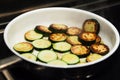 Sauteed organic zucchini squash in a frying pan Royalty Free Stock Photo