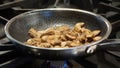 Sauteing fresh mushrooms.