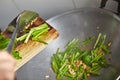 Sauteing Japanese spinach