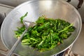 Sauteing Japanese spinach