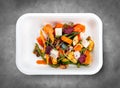 SautÃÂ©ed vegetables. Healthy diet. Takeaway food. Ecological packaging. Top view, on a gray background