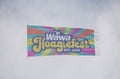 Savage Ditch, Delaware, U.S.A - July 4, 2023 - A large Wawa Hoagiefest banner flying on the sky above the beach