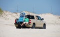 Savage Ditch, Delaware, U.S - July 4, 2023 - A man riding a truck with surf fishing beach permit
