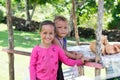 Savai`i Island, Samoa - August 1, 2018: Cute young girls selling