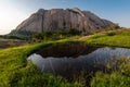 Savandurga hill reflected in a puddle Royalty Free Stock Photo