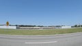 street pan International Decor retail strip mall closed abandoned seen from interstate 95