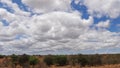 Savannah landscape in Tsavo Park, Sky with coulds, Kenya,