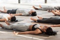 Savasana Pose. Diverse Yoga Class Members Meditating On Floor, Lying On Mats Royalty Free Stock Photo