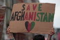 SAVE AFGHANISTAN placard at a STOP KILLING AFGHANS protest Royalty Free Stock Photo