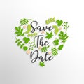 Save the date text with green leaves and heart background Royalty Free Stock Photo