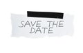 Save the Date on white paper with black tape