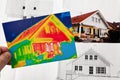 Save energy. house with thermal imaging camera Royalty Free Stock Photo