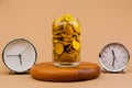 gold in a glass jar with precious time. Real estate and valuables Gold coins World gold market Gold stocks Invest in gold