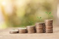 Save Money concept for Financial, Investment and Business with money coin stack for growing with sun light bokeh background Royalty Free Stock Photo