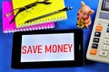 Save money-the message on the tablet PC.It is reasonable to seek benefits,effectively plan for the financial management,to avoid Royalty Free Stock Photo