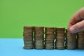 Save money for retirement and account banking for finance concept, Man hand with coin money on business office table vintage style Royalty Free Stock Photo