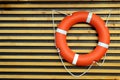 lifebuoy hanging on a wooden board to save people