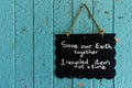 Save our earth sign hanging on a door Royalty Free Stock Photo