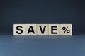 Save percent. Cubes form the words Save percent