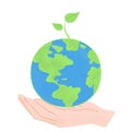 Save the planet concept. Earth in the hand of human. Take care of the world. A small shoot of a green plant. Be green