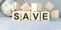 save or safe text made of wooden cube