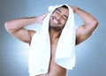 Save some of the love you give away so freely. Studio shot of a handsome young man drying himself with a towel while