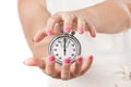 Save Time Concept. Two Woman Hands Protecting Stopwatch. Royalty Free Stock Photo