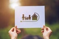 save world ecology concept environmental conservation with hands holding cut out paper earth loving ecology family showing Royalty Free Stock Photo