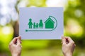 save world ecology concept environmental conservation with hands holding cut out paper earth loving ecology family showing Royalty Free Stock Photo