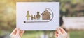 save world ecology concept environmental conservation with hands holding cut out paper earth loving ecology family showing Royalty Free Stock Photo