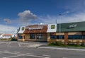 McDonalds restaurant with Mc Drive on cloudy blue sky Royalty Free Stock Photo