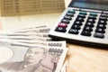Saving account passbok, japanese yen, calculator Royalty Free Stock Photo