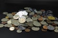 Dirty old coins on a black background