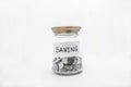 Saving Coins on jar glass
