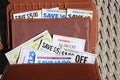 Saving Coupons in wallet for shopping Royalty Free Stock Photo