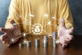 Saving energy and money. Idea for save or investment. Hope of investor concept. Male business hand putting money coin stack Royalty Free Stock Photo