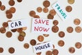 Saving money for the best life concept. Coins and signs travel, car, house, save now Royalty Free Stock Photo