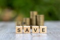 Saving money, a blog to save money and a pile of coins. Money saving investment ideas Real estate Retirement financial planning