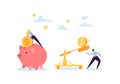 Saving Money Concept. Business Characters Collecting Golden Coins into the Pink Piggy Bank. Wealth, Budget and Earnings Royalty Free Stock Photo