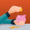 Saving money for future investment concept, Man putting coin in piggy bank Royalty Free Stock Photo