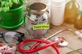 Saving money for health care insurance - money glass, stethoscope, pills and bottles Royalty Free Stock Photo