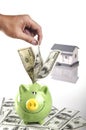 Saving money in piggy bank Royalty Free Stock Photo