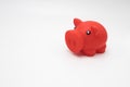 Saving money for a rainy day. Piggy banks on a white background. Savings and investments
