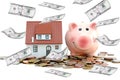 Saving money to buy a house or a property concept with piggy bank and pile of coins and banknotes Royalty Free Stock Photo