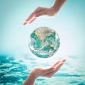 Saving water and world environmental protection concept. Element of this image furnished by NASA Royalty Free Stock Photo