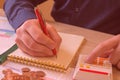 Savings, finances, economy and home concept - close up of man with calculator counting money and making notes Royalty Free Stock Photo